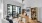 office with a sliding glass door leading to a balcony