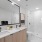 double sink vanity in bathroom with walk-in shower