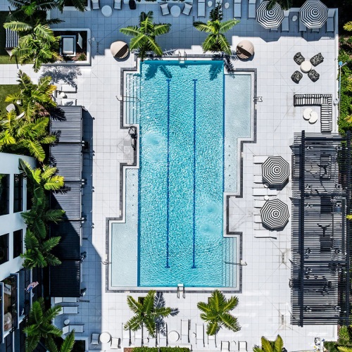 Resort-style swimming pool overhead shot of pool area