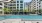 lounge chairs around pool