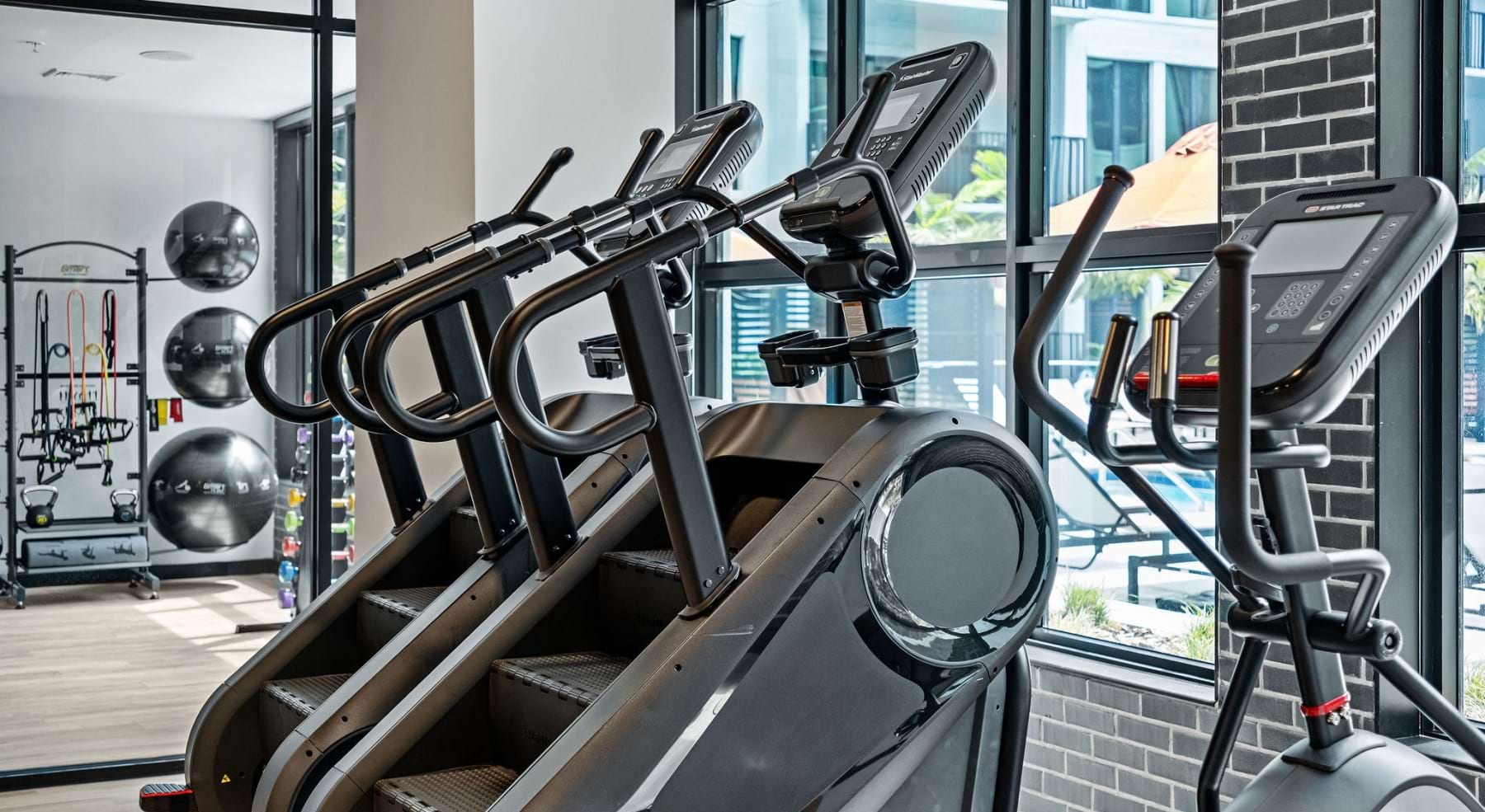 Modern fitness center at Links featuring stair climbers