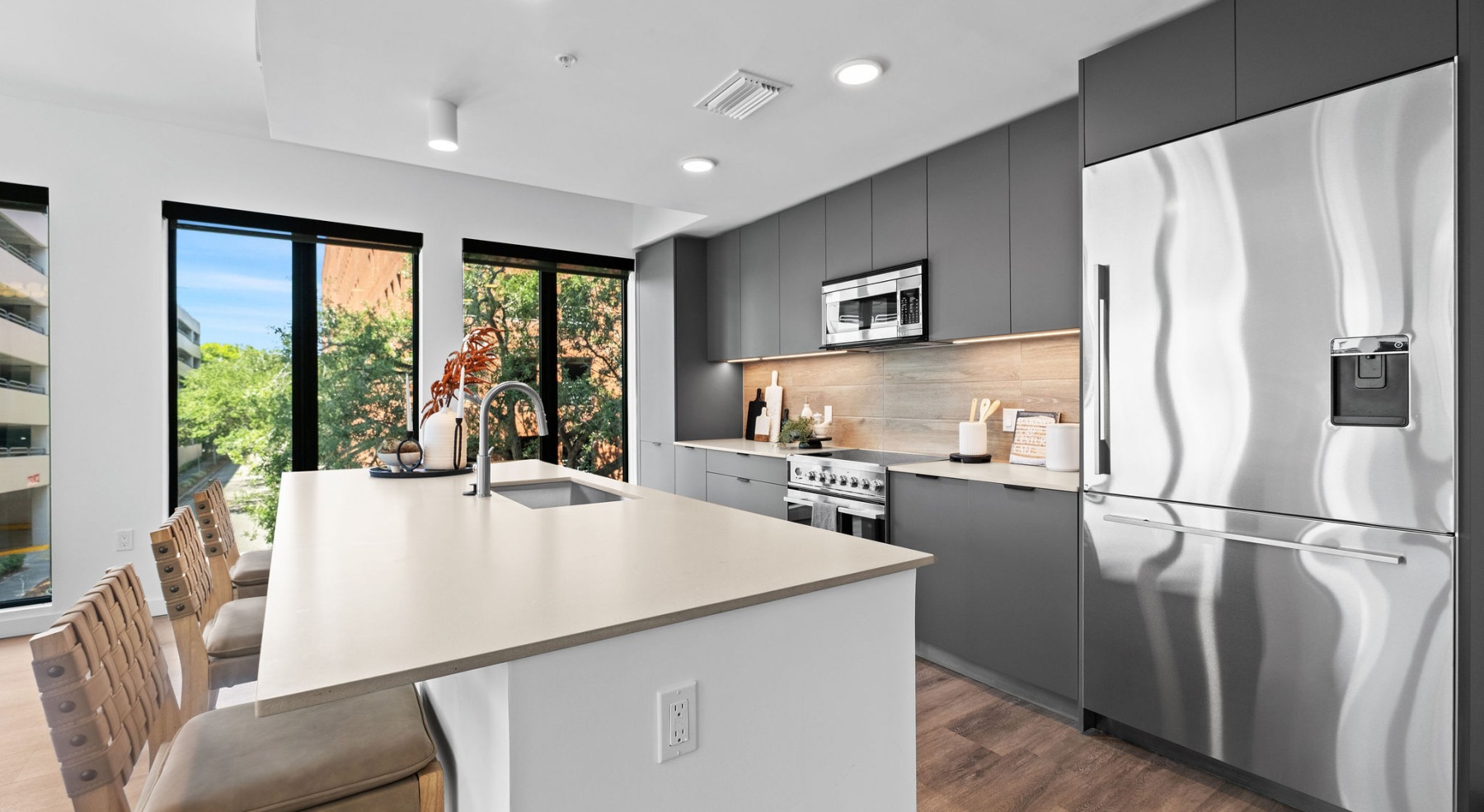 Kitchen with Island and Stainless Steel Appliances