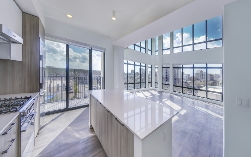 spacious floor plan with floor to ceiling windows