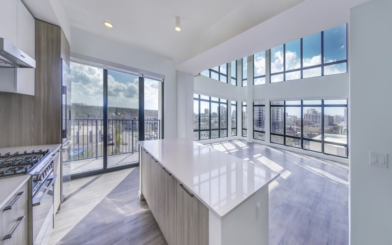 spacious floor plan with floor to ceiling windows