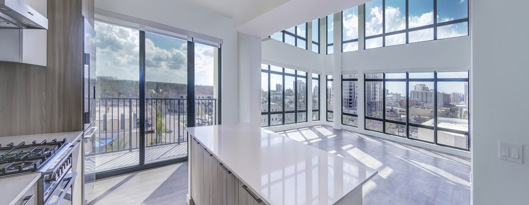 Wide-Photo of Kitchen and Living Room