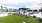 reclining lounge chairs on rooftop lawn