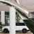 Sculpture of Hand with Vehicle in Background
