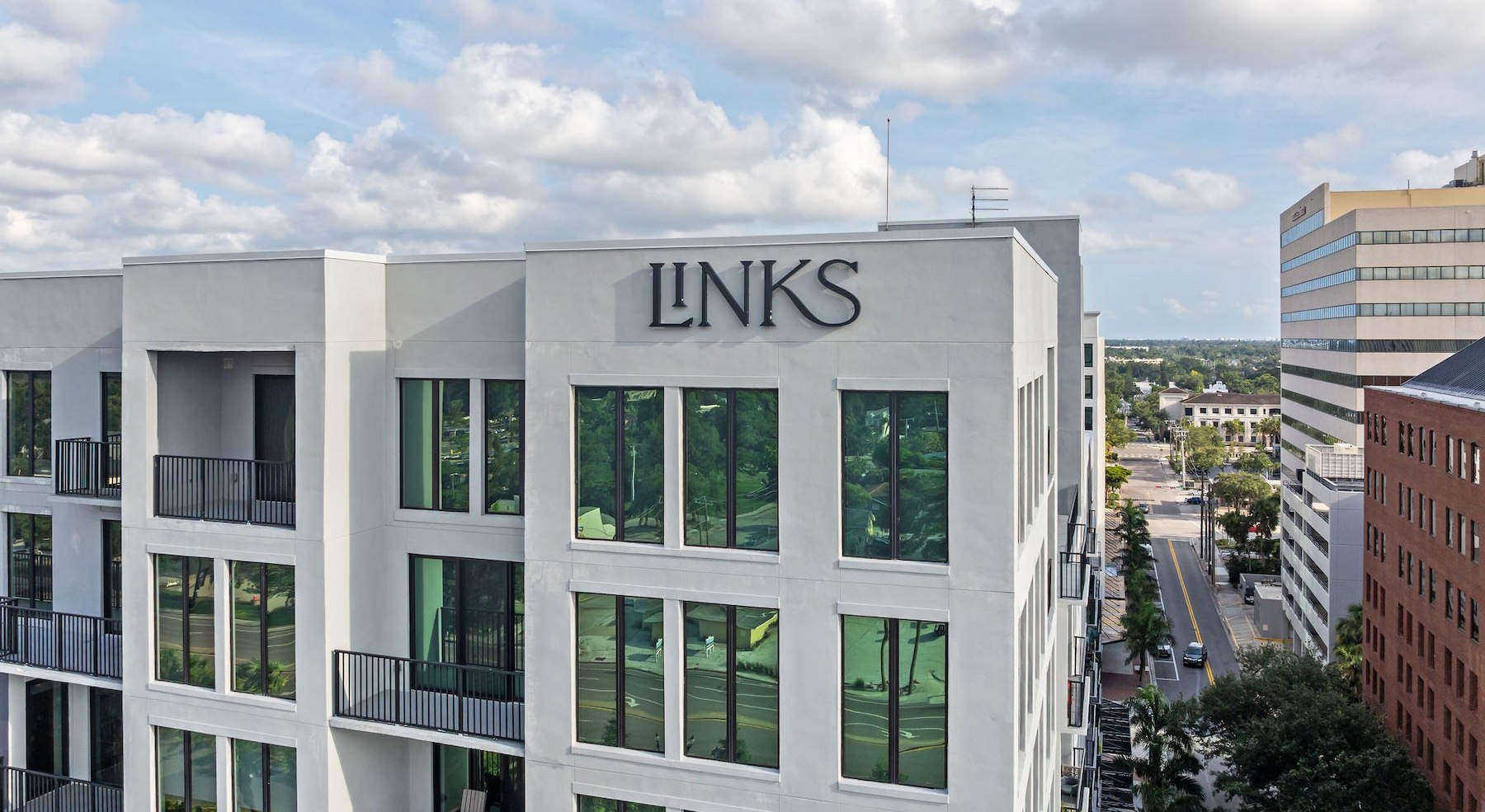 a large white building with a sign