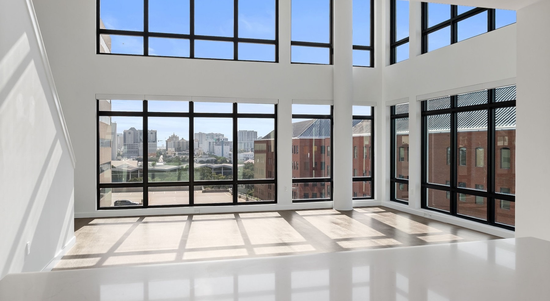 a living room with large windows