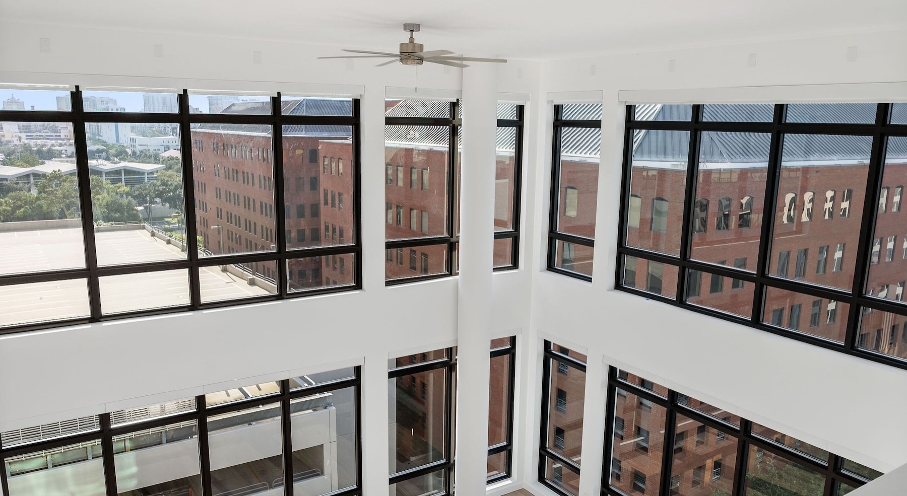 a living room with large windows